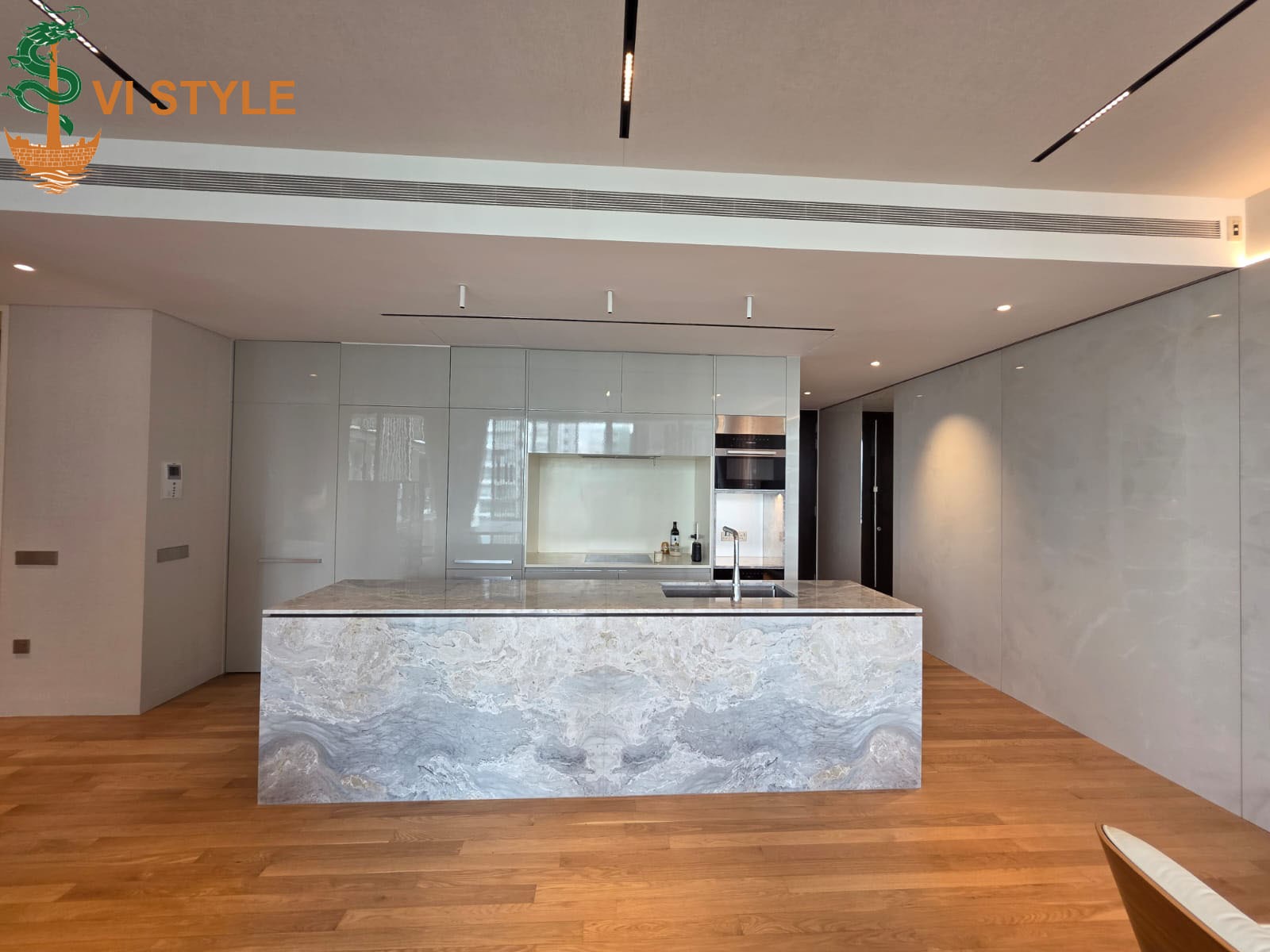 Modern kitchen renovation in Singapore with custom carpentry cabinets